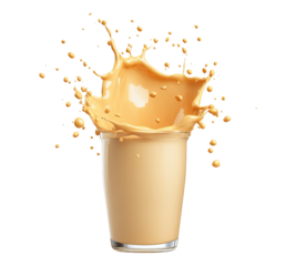 A glass of milk with a splash of milk on the side