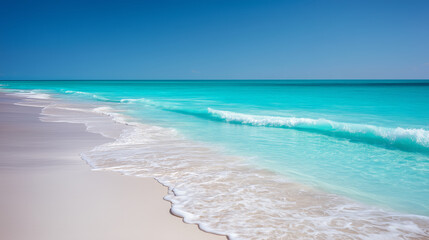 Tropical Beach with Turquoise Waves and Clear Blue Sky
