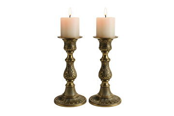 Two ornate brass candlesticks with lit candles isolated on transparent background