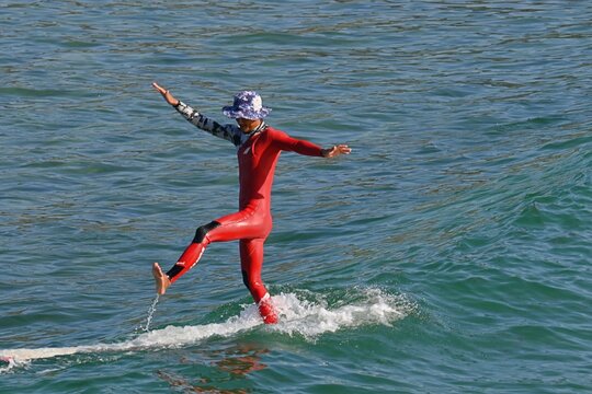 young man on the beach