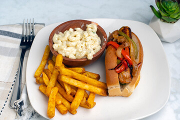 chicken sausage sandwich  with fries