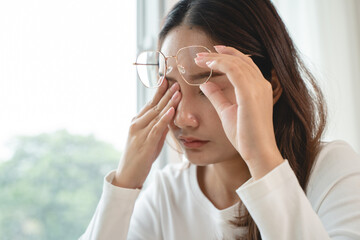 Eye problem concept, fatigue asian young woman tired eyes, irritated rubbing eye dry relief vision...