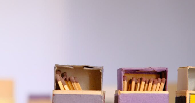 old matchbox moving horizontally on white background