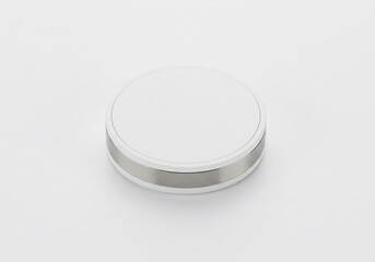 White Circular Device with Silver Band on White Background