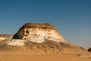 White rock formations and sand dunes in Egypt's White Desert, natural desert landscape	