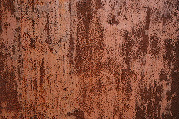 Rusty metal texture with peeling paint creating an aged weathered surface for industrial or...