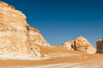White rock formations and sand dunes in Egypt's White Desert, natural desert landscape	