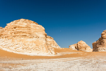 White rock formations and sand dunes in Egypt's White Desert, natural desert landscape	