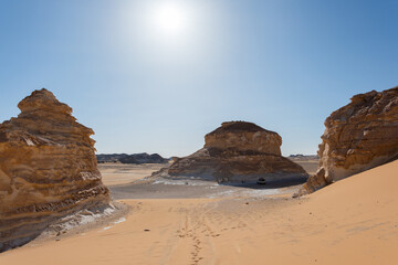 White rock formations and sand dunes in Egypt's White Desert, natural desert landscape	