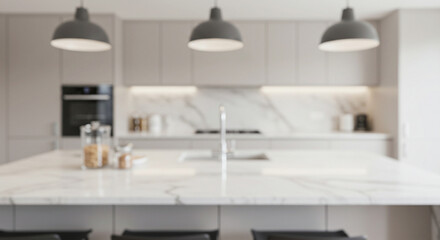 Blurred view of a modern kitchen interior with marble countertops, cabinets, sink, and three pendant lights.