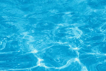  Turquoise rippled water texture background. Shining blue water ripple pool abstract photo. 