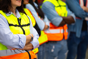 arm crossed Unity and teamwork. Engineering and civil factory team standing. Portrait engineer factory manager worker and mechanic team together at metal sheet profiling factory. Industrial production