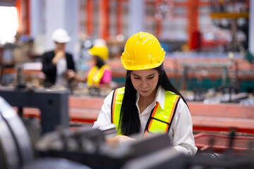 maintenance and service factory : indian female Professional Mechanical Engineer in safety hardhat...