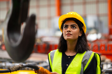 remote control overhead crane : Indian female engineer worker working control sheet metal roof...