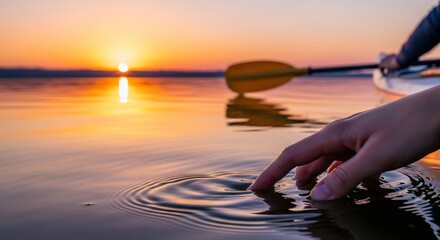 Sunset Kayak Paddle Ripples Hand in Water