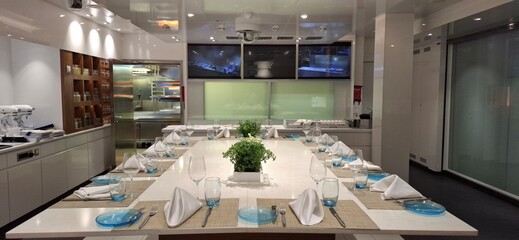 Modern Kitchen Setup With Dining Table and Elegant Glassware