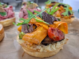 Gourmet Canapés Featuring Vegetables, Arugula, and a Variety of Fresh Ingredients