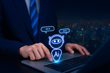 Man using AI chatbot on laptop representing modern technology, virtual assistance and digital communication interface