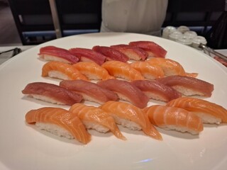 Fresh Sushi Assortment on a Plate Featuring Salmon and Tuna Nigiri