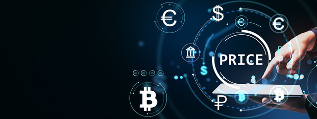 Digital currency exchange concept with price data and financial symbols on virtual interface accessed via tablet by hand on dark background.