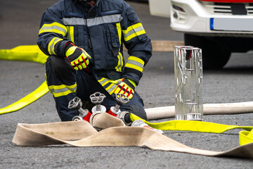 On-site deployment management – firefighters secure supply and hose distributor. Technical...