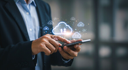 Person using smartphone with cloud computing interface and wearing a suit jacket in a blurred setting