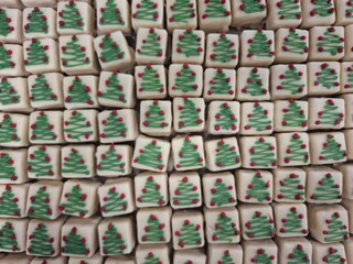 Rows of Festive Christmas Treats Decorated with Holiday-Themed Designs