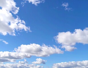 Naklejka premium Fluffy clouds in a clear blue sky