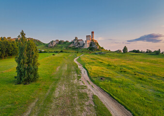 The ruins of the castle in Olsztyn near Czestochowa in the light of the setting sun. Poland