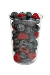 High-resolution fruit photo of cherries, raspberries and blueberries inside glass taken with split-focus technique.