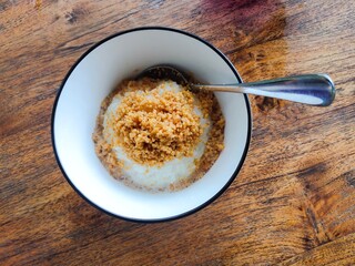 cup of sticky rice with milk sauce