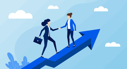 Two businesswomen shaking hands on a blue arrow pointing upwards representing success and growth in a team collaboration