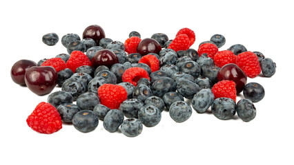 The High-resolution fruit photo of cherries, raspberries and blueberries taken with split-focus technique.