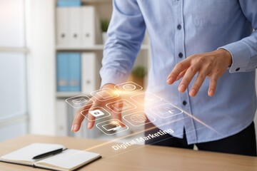 Businessman interacting with digital marketing icons hovering above wooden desk, notebook and pen for modern business strategy and innovation