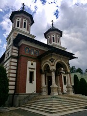 Sinaia Monastery features a striking mix of Byzantine and Brancovenesc architectural styles. The...