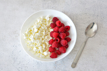 Cottage Cheese with Fresh Raspberries A Healthy Breakfast flat lay