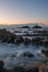 Layer of rocky coastline in the morning.