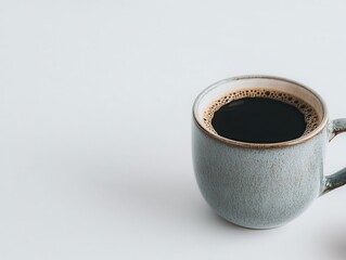Business partnership coffee concept. A cozy coffee cup filled with dark brew on a minimalist background.