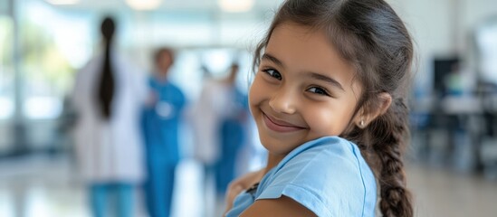 Smiling girl in a hospital setting