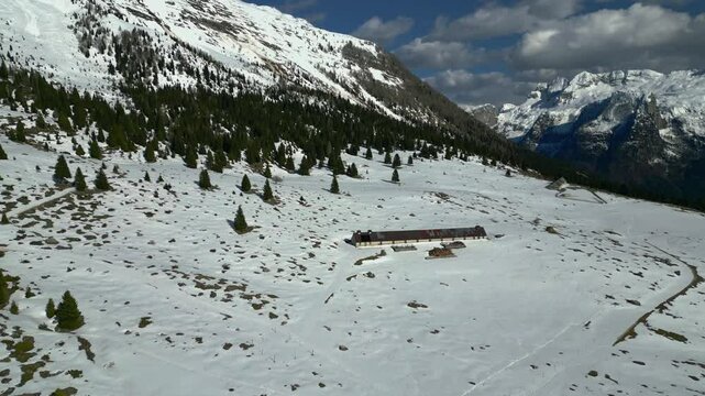 Spring snow on the Montasio plateau. Looking down on Montasio and Canin from above.