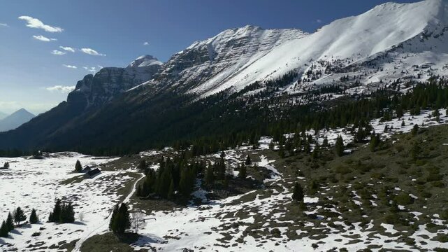 Spring snow on the Montasio plateau. Looking down on Montasio and Canin from above.