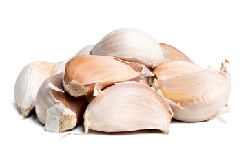 The High resolution photo of unpeeled garlic pieces.