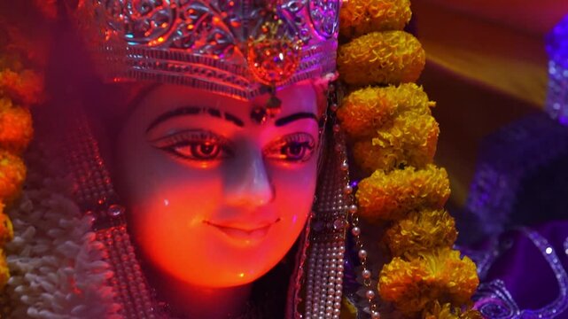 Smiling Idol of Sita Ram with Floral Decor
