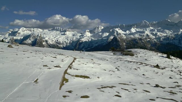 Spring snow on the Montasio plateau. Looking down on Montasio and Canin from above.