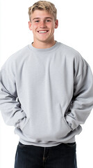 Fototapeta premium Smiling young man poses in a gray sweatshirt and jeans