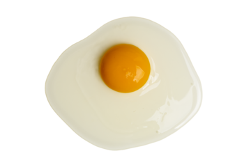 The Photo of a raw egg shell cracking revealing the egg white and raw yolk.