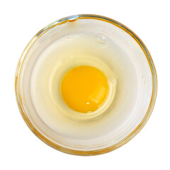 The Photo of raw eggs in a cooking cup