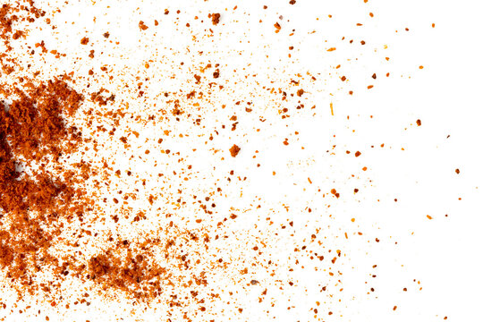 The Photograph of paprika powder scattered on white background