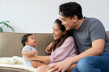 A loving parent embraces their infant, sharing warmth and innocence in a moment of deep connection. This happy family cherishes parenthood, strengthening their relationship through beauty of parenting