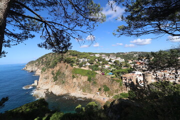 Rocks, stones and cliffs of the Codolar cove of Tossa de Mar in the south of the Costa Brava in...